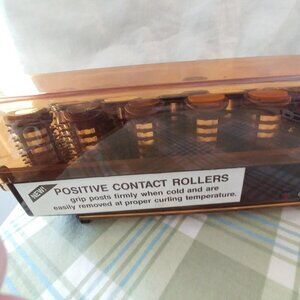 Set of Vintage Vidal Sassoon positive contact rollers, Missing one of the roller